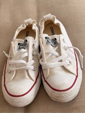 Converse Women’s Low Top Canvas Sneakers in White with Red Trim